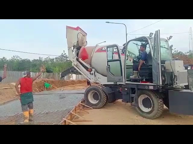 self loading concrete mixer truck working